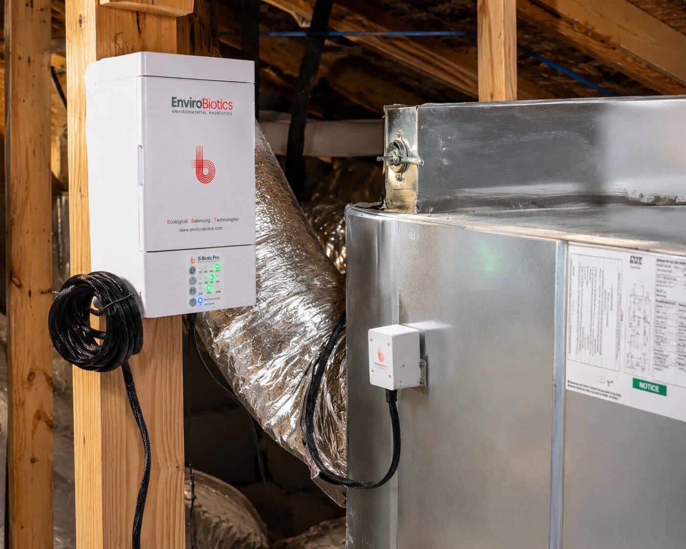 The E-Biotic Home unit installed on ductwork in an attic